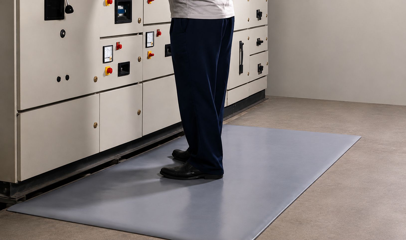 Insulating mat installed in a substation switchgear room with cream mat flooring